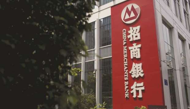 A China Merchants Bank Co building stands in Guangzhou. Chinese investors and savers just experienced something thatu2019s never happened before: Losses on some of their $3.5tn state bank issued high-yield wealth management products. Among the investments, the worst performer is a China Merchants Bank Co product.