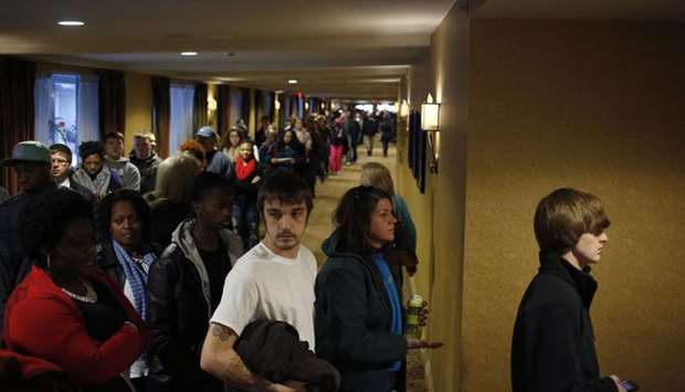 People wait in line to enter a job fair in Louisville, Kentucky.