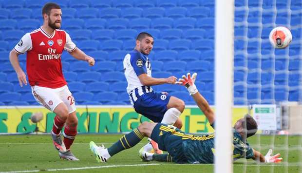 Brightonu2019s Neal Maupay (centre) scores a goal during the EPL match against Arsenal in Brighton, United Kingdom, yesterday. (Reuters)