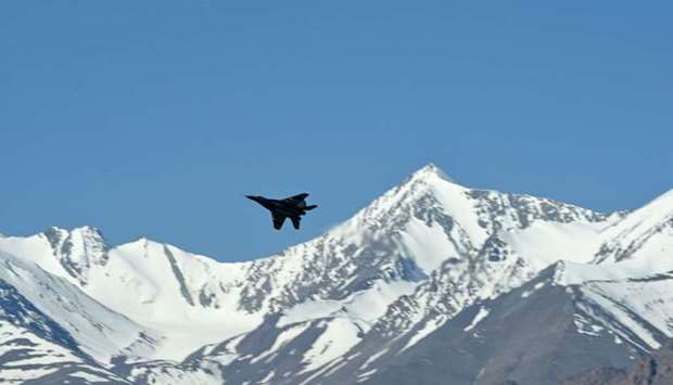 An Indian fighter jet flies over a mountain range near Leh, the joint capital of the union territory of Ladakh. AFP