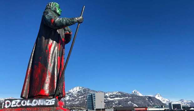 The vandalised statue of Hans Egede is seen in Nuuk.
