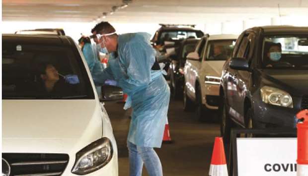 A coronavirus drive-through testing facility is seen as the state of Victoria experiences an outbreak of cases, in Melbourne, Australia, yesterday.