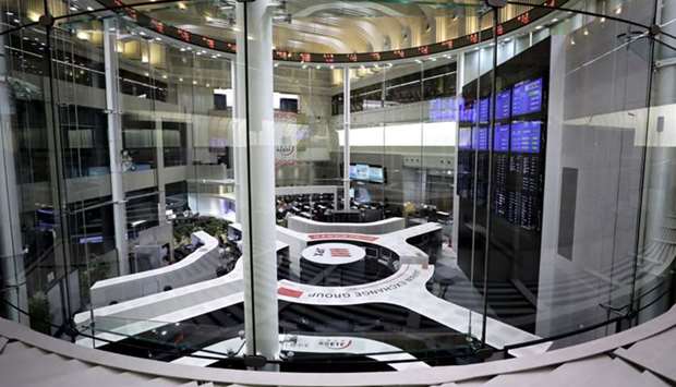Employees work at the Tokyo Stock Exchange, operated by Japan Exchange Group, in Tokyo. The Nikkei tumbled 1.2% to 22,259.79 points yesterday.