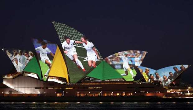 Sydney Opera House lights up in celebration of Australia and New Zealandu2019s joint bid to host the FIFA Womenu2019s World Cup 2023. (Reuters)