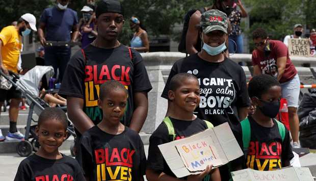 Participants take part in the Black Mamas March yesterday as racial inequality protests continue in Washington, DC.