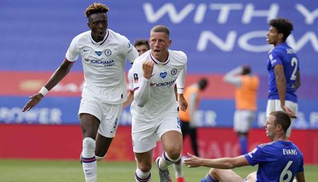 Chelseau2019s Ross Barkley (centre) celebrates after scoring a goal during the FA Cup quarter-final against Leicester City in Leicester, United Kingdom, yesterday. (Reuters)