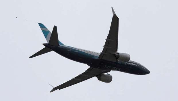 A Boeing 737 MAX airplane takes off on a test flight from Boeing Field in Seattle, Washington