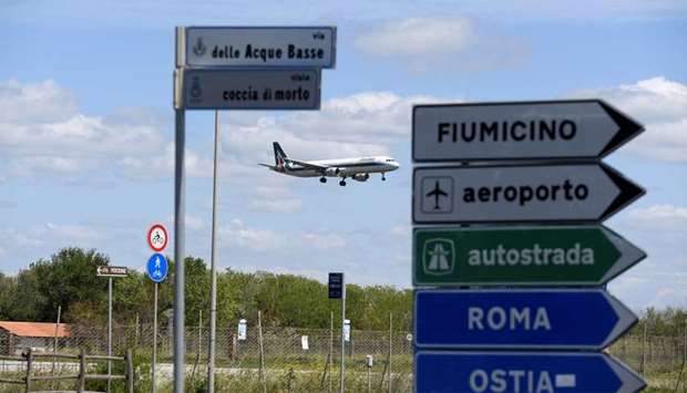 A plane lands at the Fiumicino airport  in Rome, Italy