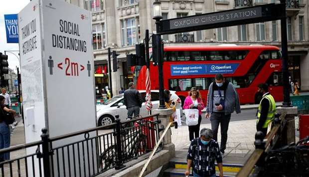 People walk on a street near the Oxford Circus station, amid the coronavirus disease (COVID-19) outbreak in London, Britain