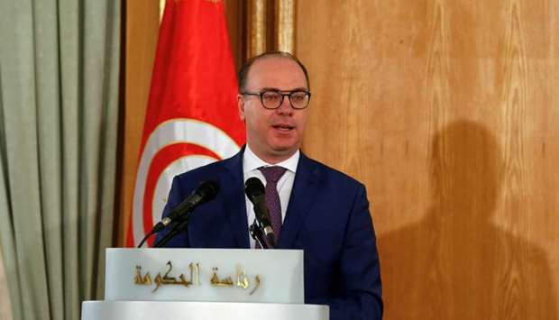 Tunisian Prime Minister Elyes Fakhfakh speaks during a handover ceremony in Tunis, February 28, 2020