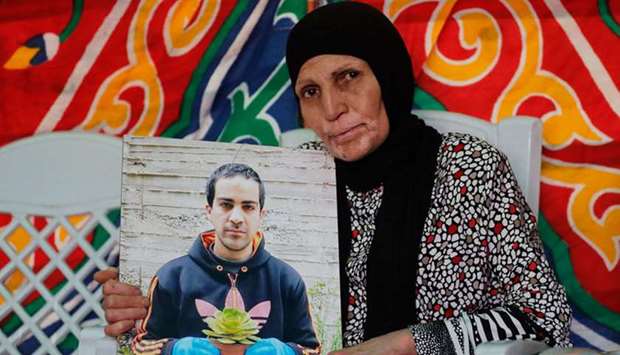 The mother of Iyad Hallak, mourns her son at their home in east Jerusalem.