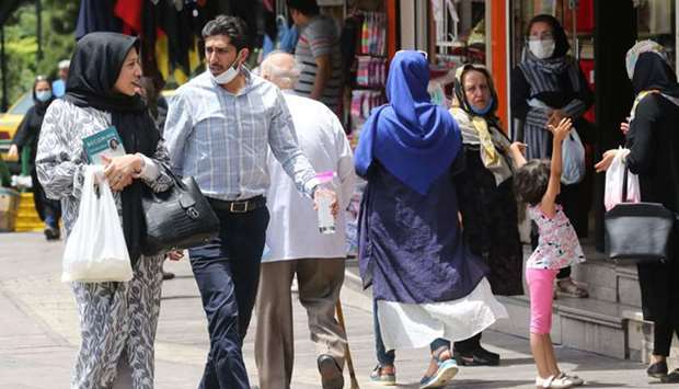 Iranians shop in the capital Tehran yesterday during the Covid-19 coronavirus pandemic.