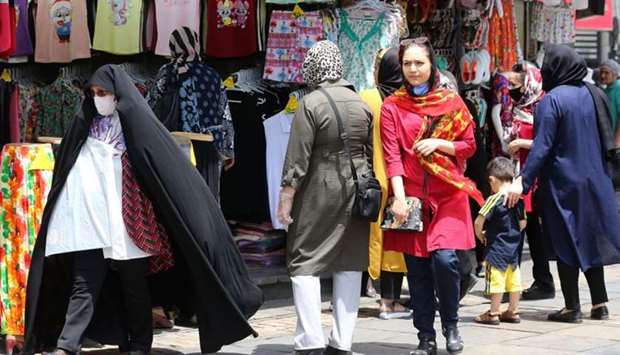 Iranians shop the capital Tehran yesterday during the coronavirus pandemic. Iran today lamented that people were ignoring social distancing rules. ,The fact that people have become completely careless regarding this disease, was of great concern, said Health Minister Saeed Namaki yesterday.