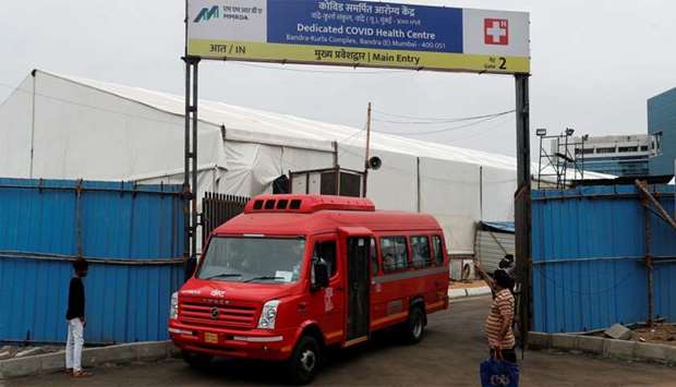 A bus carrying coronavirus disease (COVID-19) patients leaves a makeshift hospital to transport them to other hospitals before cyclone Nisarga makes it landfall, in Mumbai, India