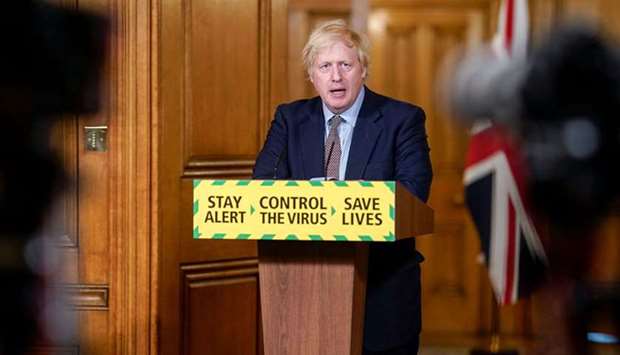 Prime Minister Boris Johnson speaks during a remote press conference to update the nation on the Covid-19 pandemic, inside 10 Downing Street in central London yesterday.