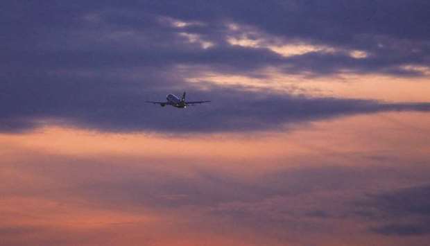 A passenger aircraft flies at dusk from Frankfurt Airport. An unexpected and worrying downside of Covid-19u2019s impact on flying is now being reported by weather forecasters. Crucial weather observations supplied by commercial aircraft have now been dramatically cut after the grounding of most of global fleet.