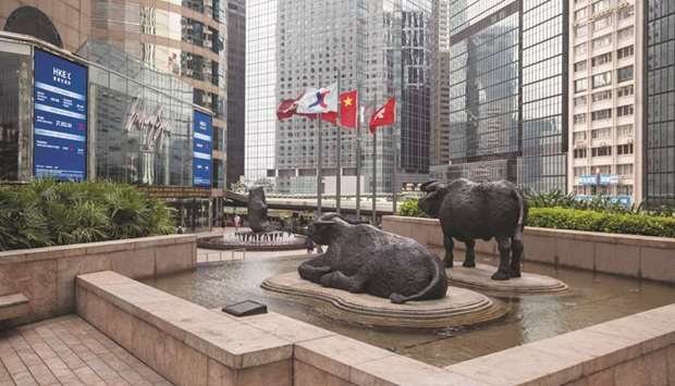 Sculptures displayed outside the Hong Kong Stock Exchange. The Hang Seng closed up 1.7% to 24,770.41 points yesterday.