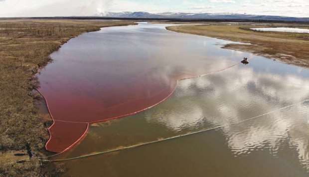 This handout photograph taken and released by the Marine Rescue Service of Russia on Wednesday shows a large diesel spill in the Ambarnaya River, outside Norilsk.
