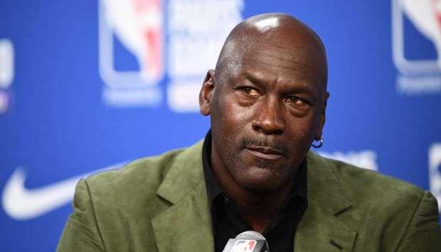 In this file photo taken on January 24, 2020, former NBA star and owner of Charlotte Hornets team Michael Jordan looks on as he addresses a press conference ahead of the NBA match against Milwaukee Bucks at the AccorHotels Arena in Paris. (AFP)