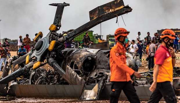 The wreckage of an Indonesian military MI-17 helicopter is seen at a crash site in Kendal, yesterday.