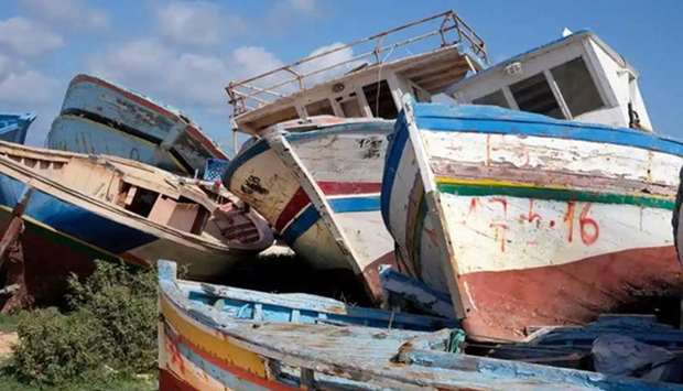 This picture taken last year shows the abandoned remains of migrant boats on Lampedusa.