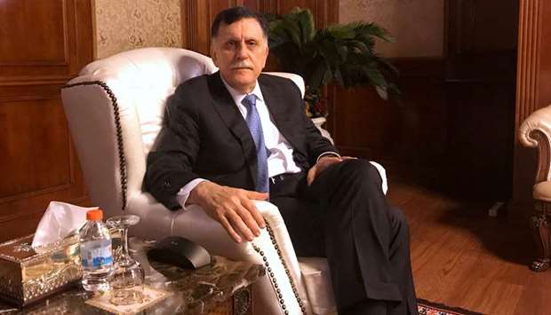 File photo shows Libyau2019s internationally recognised Prime Minister Fayez al-Serraj at his office in Tripoli.