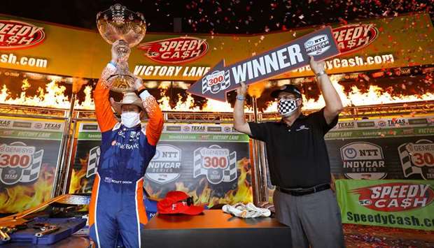 Scott Dixon (left) celebrates after winning the Genesys 300 at Texas Motor Speedway on June 6. PICTURE: USA TODAY Network