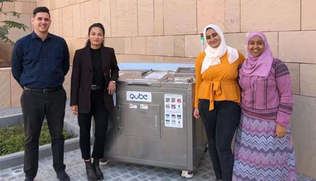 Salma Hassan (second from right) next to the u201cup-cyclingu201d machines introduced in the campus.
