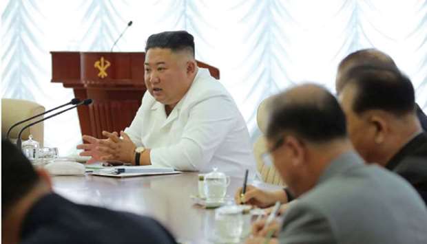 North Korean leader Kim Jong-un speaks during the 13th Political Bureau meeting of the 7th Central Committee of the Workersu2019 Party of Korea (WPK) in an undisclosed location in North Korea.
