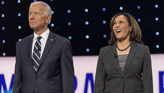 A CHANCE? Joe Biden and Kamala Harris pose for the photo spray during a commercial break at the second of two Democratic Debates in Detroit hosted by CNN and sanctioned by the DNC.