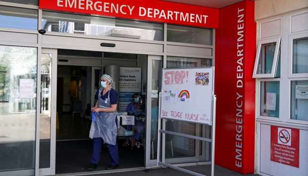 A triage nurse waits for patients in the Emergency Department at Frimley Park Hospital in Surrey, Britain, May 22