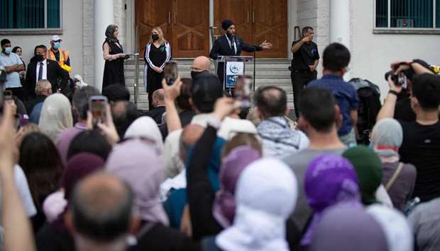 New Democratic Party (NDP) leader Jagmeet Singh speaks from the podium at a vigil for the victims of the deadly vehicle attack on five members of the Canadian Muslim community in London, Ontario, Canada