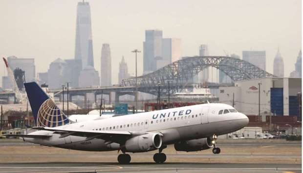 A United Airlines passenger jet takes off with the New York City as a backdrop at Newark Liberty International Airport, New Jersey (file). Opec stuck to its prediction of a strong world oil demand recovery in 2021 led by the US and China despite uncertainties stemming from the pandemic, pointing to a need for more oil from the producer group.