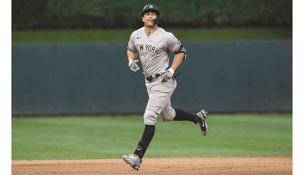 Giancarlo Stanton of New York Yankees rounds the bases after hitting a two-run home run against Minnesota Twins in the fifth inning of the game at Target Field in Minneapolis, Minnesota. (Getty Images/AFP)