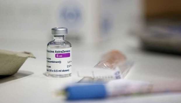 A vial of AstraZeneca coronavirus vaccine is seen at a vaccination centre in Westfield Stratford City shopping centre, amid the outbreak of coronavirus disease, in London