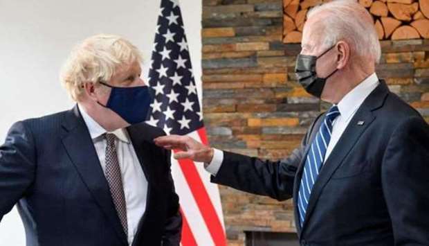 Britain's Prime Minister Boris Johnson (L) and US President Joe Biden. (AFP)