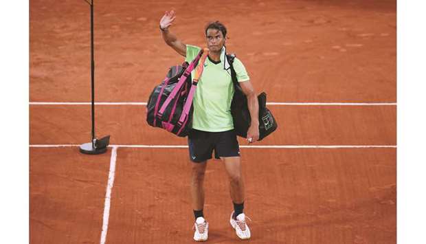 Spainu2019s Rafael Nadal leaves the court after losing his French Open semi-final against Serbiau2019s Novak Djokovic (not pictured) at Roland Garros in Paris, France, on Friday. (Reuters)