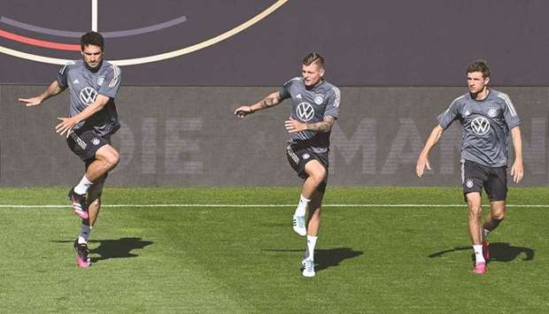 Germanyu2019s Mats Hummels (left), Toni Kroos (centre) and Thomas Mueller train in Innsbruck, Austria, yesterday. (AFP)