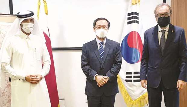 Farhan al-Sheikh al-Sayed with South Korean ambassador Kim Chang-mo and Serbian ambassador Jasminko Pozderac.