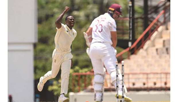 Kagiso Rabada (left) of South Africa celebrates after dismissing Joshua de Silva of West Indies during the first Test in Gros Islet, Saint Lucia, yesterday. (AFP)