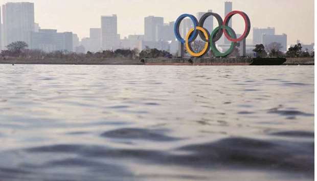 UNDER A CLOUD: The giant Olympic rings seen over the sea amid the coronavirus outbreak in Tokyo in January. (Reuters file photo)