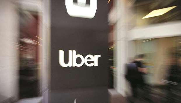 In this file pan zoom image, an Uber logo is seen outside the companyu2019s headquarters in San Francisco, California. (AFP)