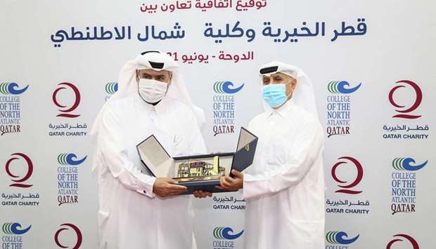 Yousef bin Ahmed al-Kuwari with Dr Salem Al-Naemi.