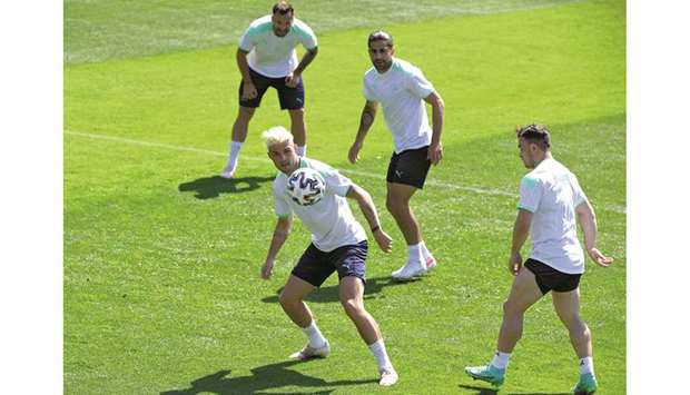 Switzerlandu2019s Granit Xhaka (left) trains with teammates in Rome yesterday. (Reuters)