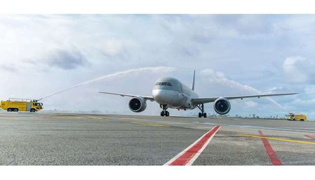 Water salute being given to Qatar Airways inaugural flight at Abidjan airport