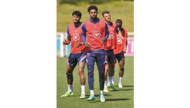 Englandu2019s forward Marcus Rashford (centre) and his teammates take part in a training session at the St Georgeu2019s Park in London yesterday. (AFP)