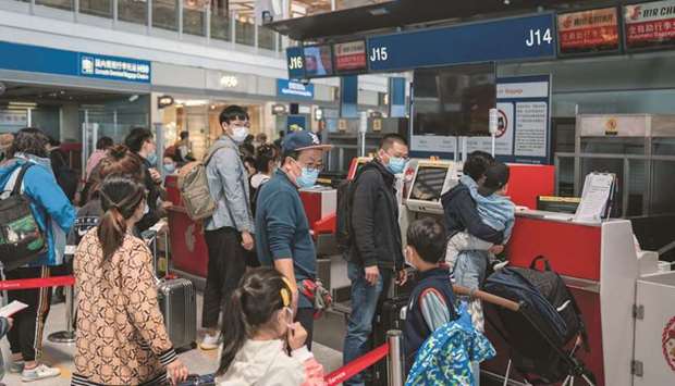 Travellers line up at Air China counters at Beijing Capital International Airport. Unruly passengers remain a major concern for air carriers worldwide. While serious disruptive behaviour remains rare, it can often be costly and cause aircraft delays.
