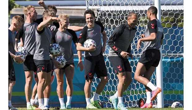 Denmarku2019s players take part in an training session in Helsingor, north of Copenhagen, on the eve of their Euro 2020 Group B match against Belgium. (AFP)