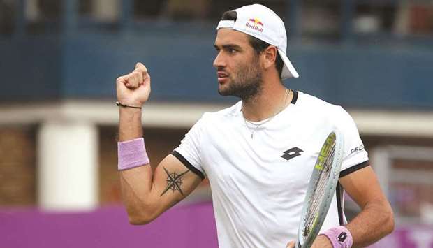 Italyu2019s Matteo Berrettini reacts during his quarter-final match against Britainu2019s Andy Murray at the Queenu2019s Club Championships in London yesterday. (Reuters)