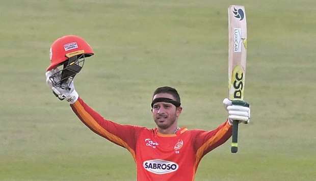Islamabad Unitedu2019s Usman Khawaja celebrate after scoring century against Peshawar Zalmi at the Sheikh Zayed Stadium in Abu Dhabi yesterday. (@PCB)